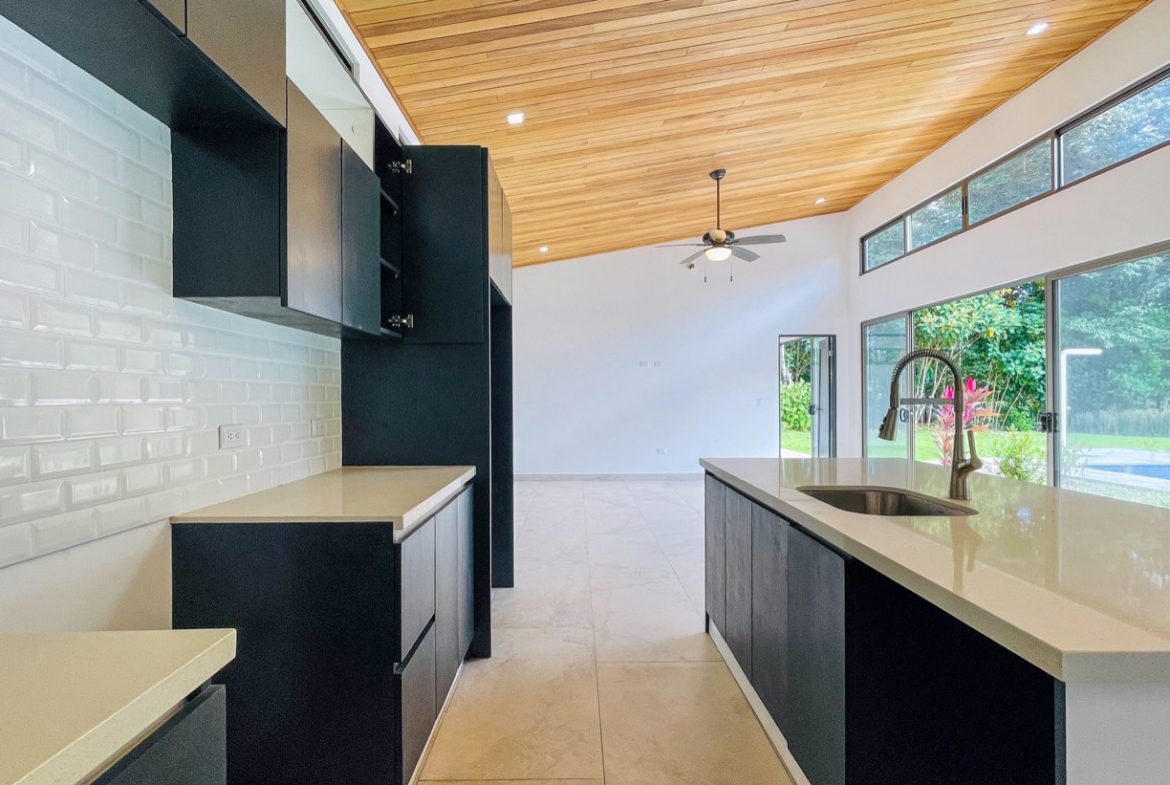 PROPERTY WITH THREE BEDROOM HOME IN A GATED COMMUNITY, IN OJOCHAL – 0.25 ACRES
