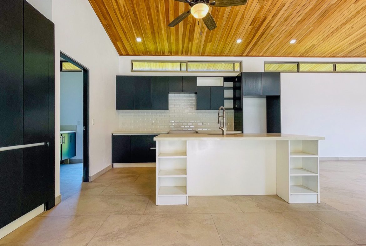 PROPERTY WITH THREE BEDROOM HOME IN A GATED COMMUNITY, IN OJOCHAL – 0.25 ACRES