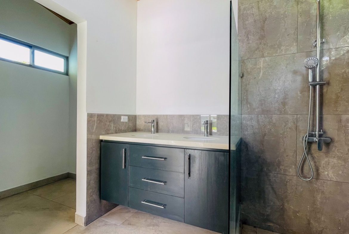 PROPERTY WITH THREE BEDROOM HOME IN A GATED COMMUNITY, IN OJOCHAL – 0.25 ACRES