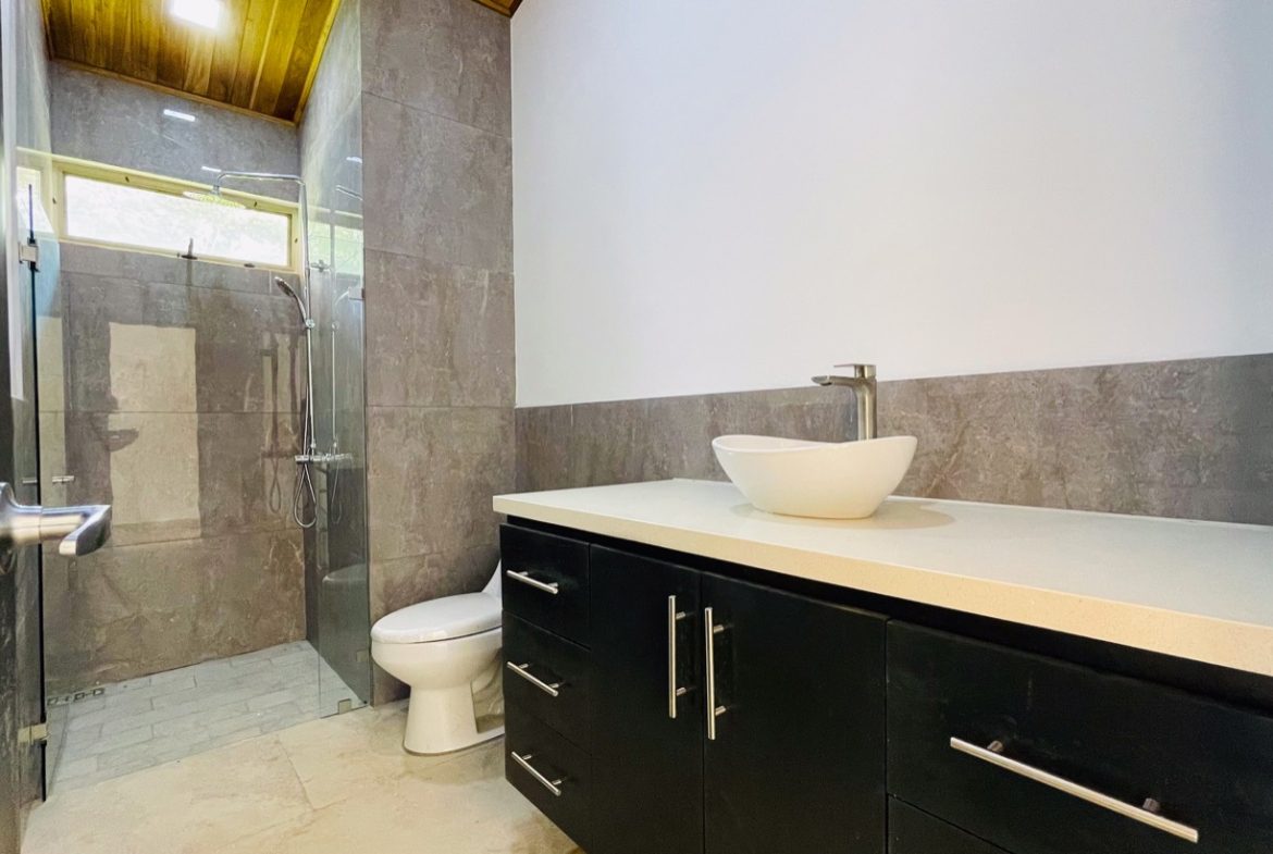 PROPERTY WITH THREE BEDROOM HOME IN A GATED COMMUNITY, IN OJOCHAL – 0.25 ACRES