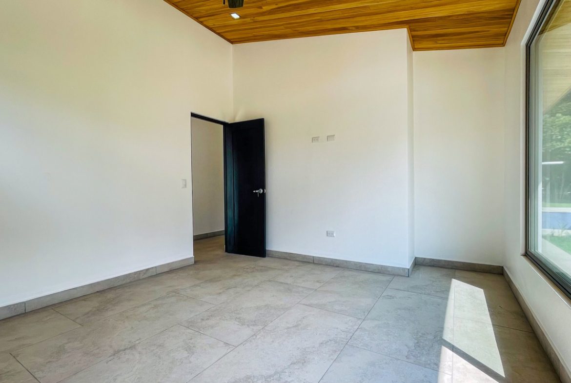 PROPERTY WITH THREE BEDROOM HOME IN A GATED COMMUNITY, IN OJOCHAL – 0.25 ACRES