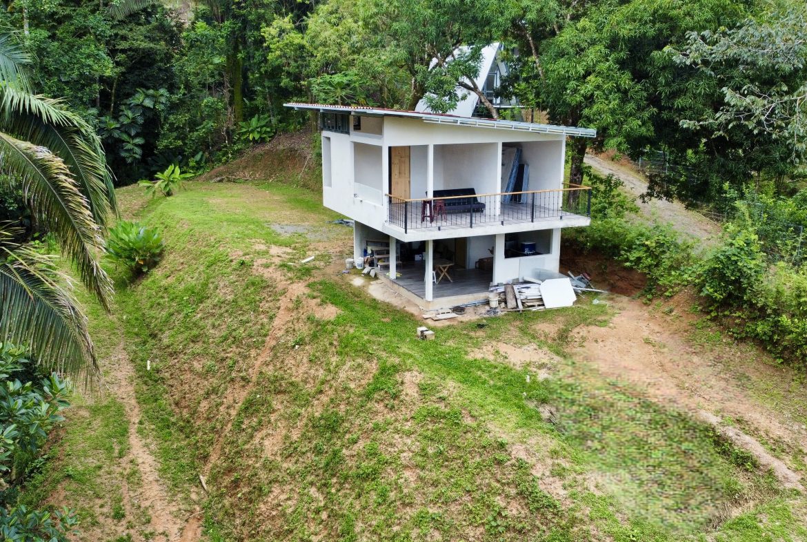 PROPERTY UNDER CONSTRUCTION WITH PROPERTY LAND VIEWS, IN PLAYA HERMOSA – 0.24 ACRES