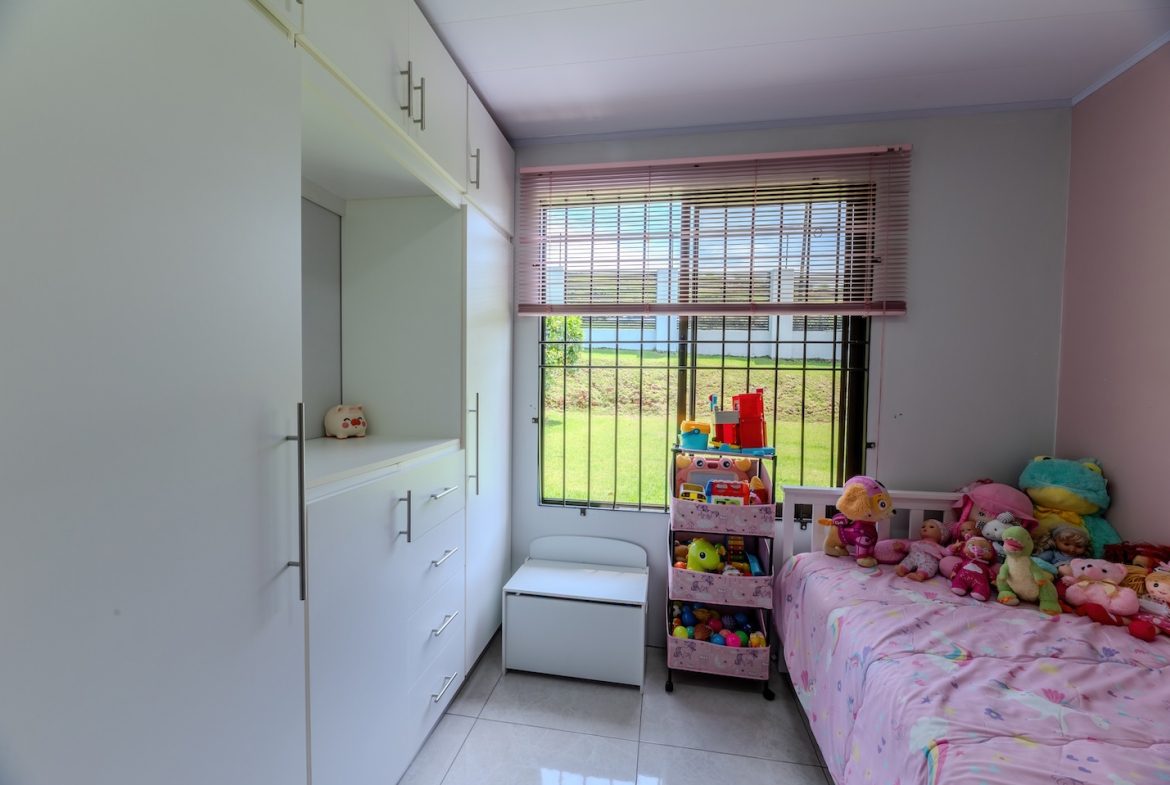 PROPERTY WITH THREE BEDROOM AND GARDEN WITH FRUIT TREES, IN PEÑAS BLANCAS – 0.19 ACRES