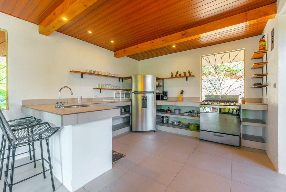 HOTEL PROPERTY WITH TEN BEDROOMS NEAR TO THE BEACH, IN OJOCHAL – 1.5 ACRES