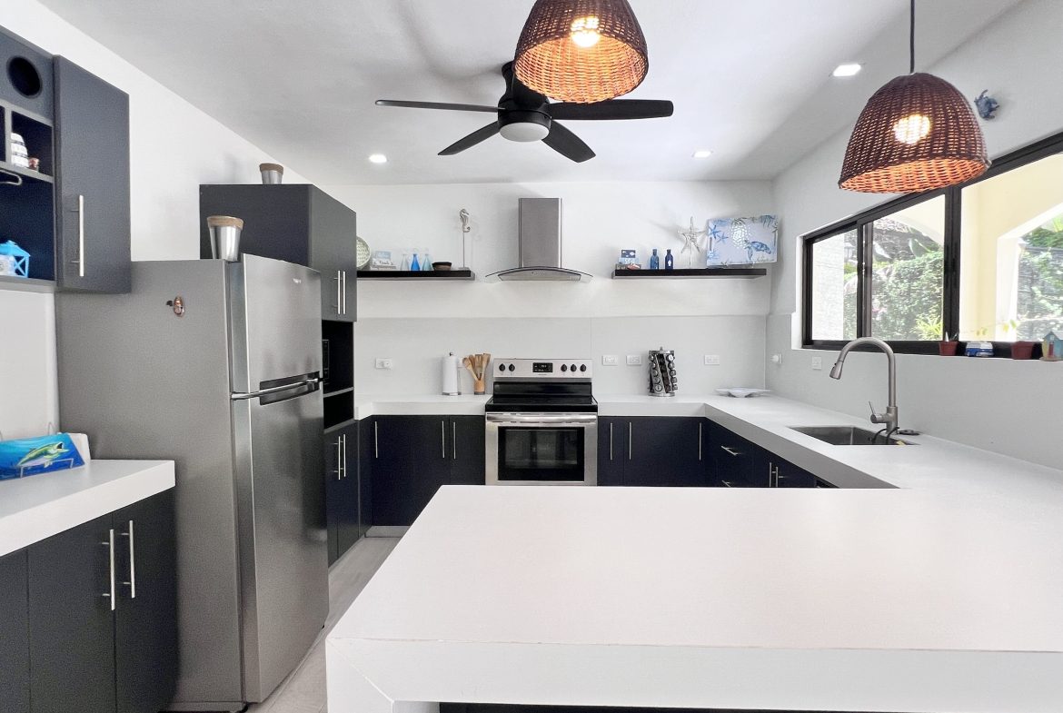VILLA TORTUGA IN GATED COMMUNITY NEAR TO QUEPOS CENTER  – 0.08 ACRES