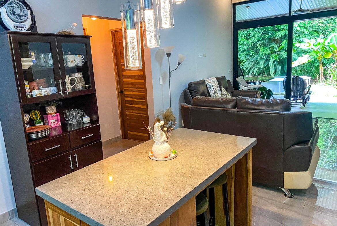 PROPERTY WITH FRUIT TREES IN A BEAUTIFUL GARDEN, IN OJOCHAL – 0.26 ACRES, Uvita, Costa Rica — photo 8