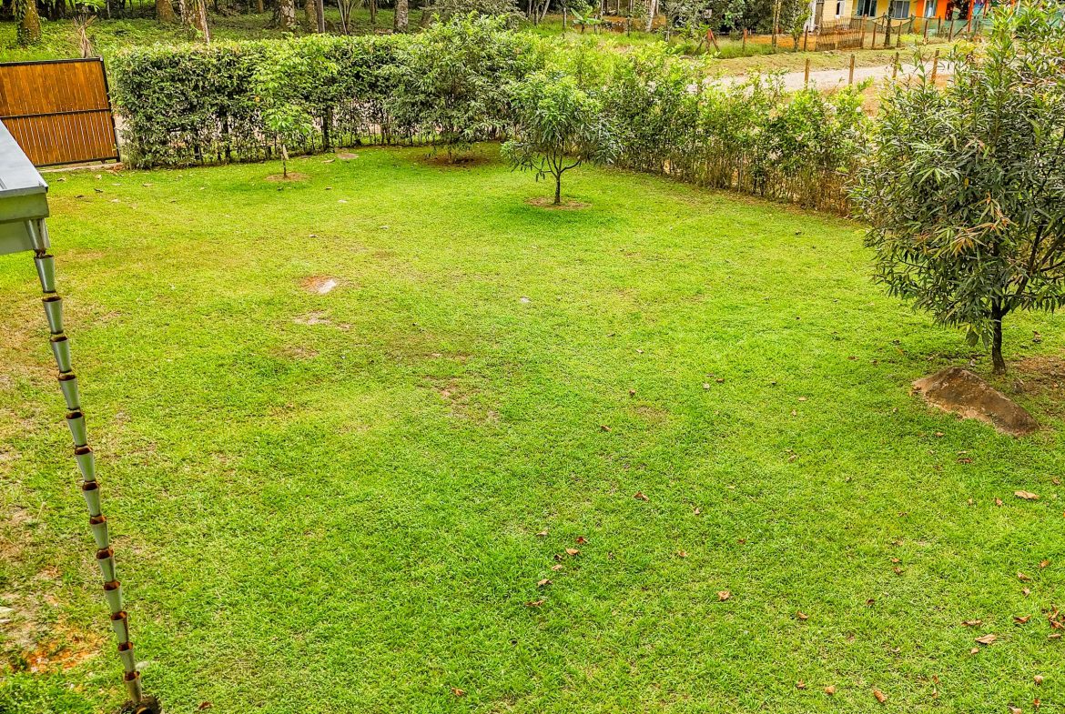 PROPERTY WITH FRUIT TREES IN A BEAUTIFUL GARDEN, IN OJOCHAL – 0.26 ACRES