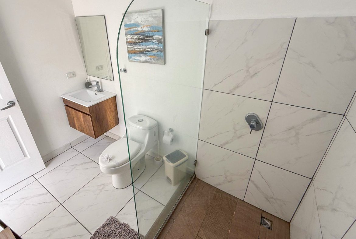 PROPERTY WITH TWO BEDROOM A STEPS OF THE BEACH, IN BAHIA BALLENA – 0.09 ACRES