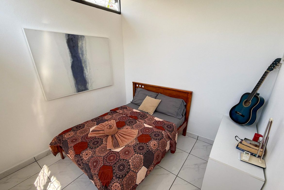 PROPERTY WITH TWO BEDROOM A STEPS OF THE BEACH, IN BAHIA BALLENA – 0.09 ACRES