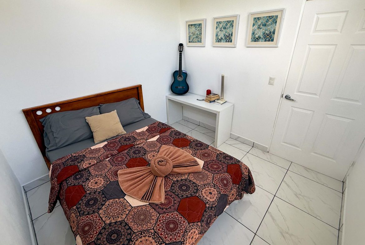 PROPERTY WITH TWO BEDROOM A STEPS OF THE BEACH, IN BAHIA BALLENA – 0.09 ACRES