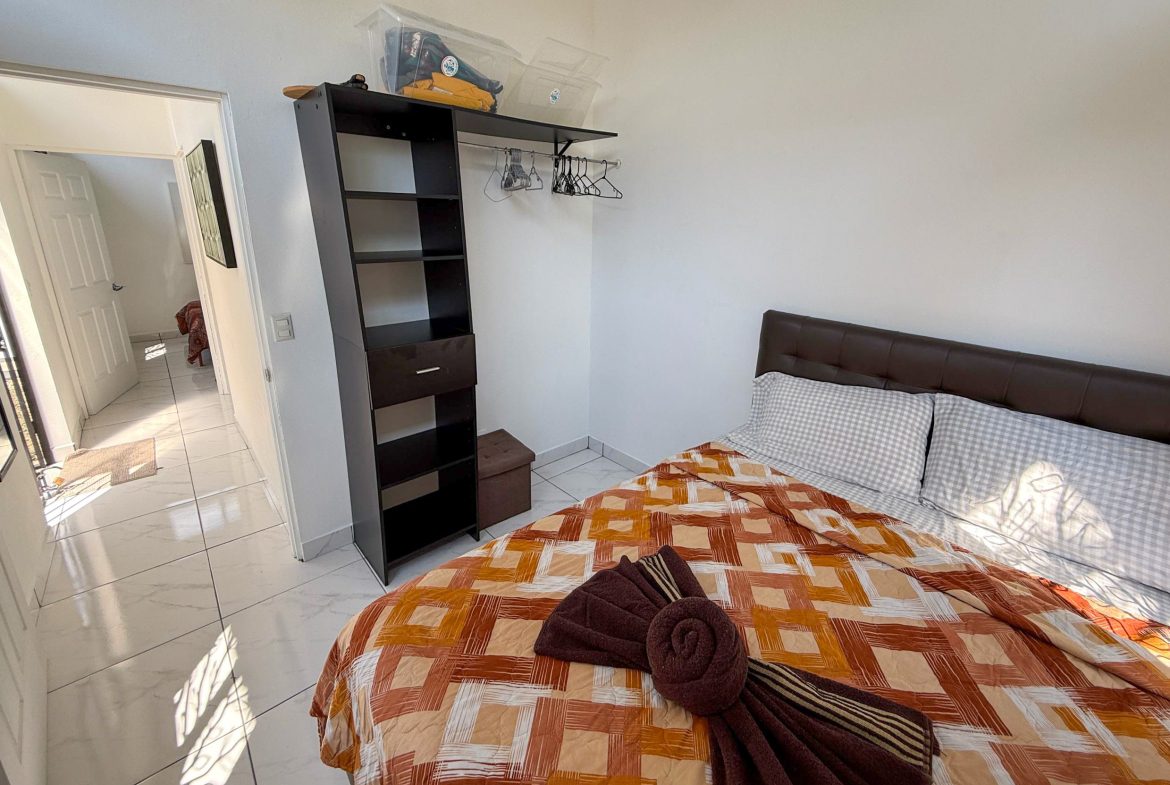 PROPERTY WITH TWO BEDROOM A STEPS OF THE BEACH, IN BAHIA BALLENA – 0.09 ACRES