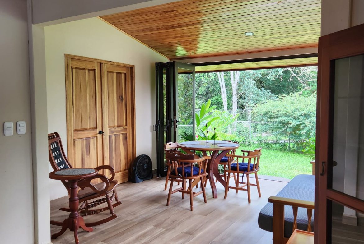 PRIVATE RIVERFRONT ESTATE WITH MAIN HOME, GUEST CABIN AND LUSH GROUNDS ON 0.68-ACRE