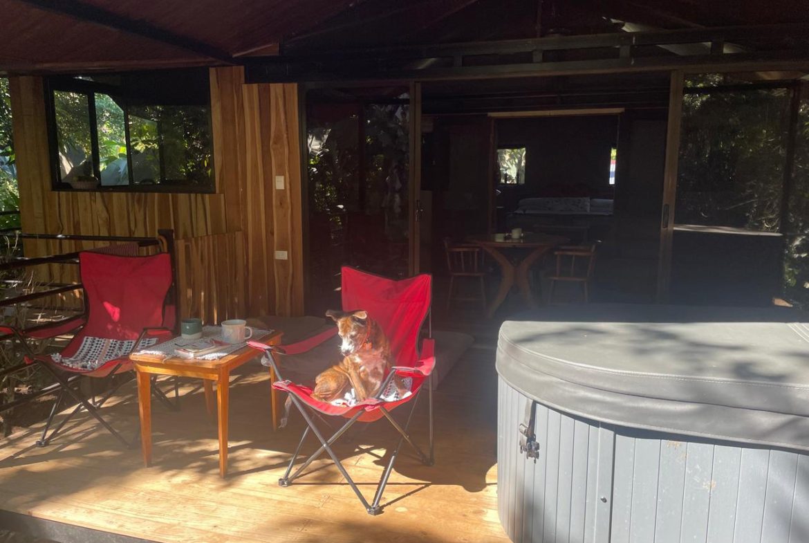 PRIVATE RIVERFRONT ESTATE WITH MAIN HOME, GUEST CABIN AND LUSH GROUNDS ON 0.68-ACRE