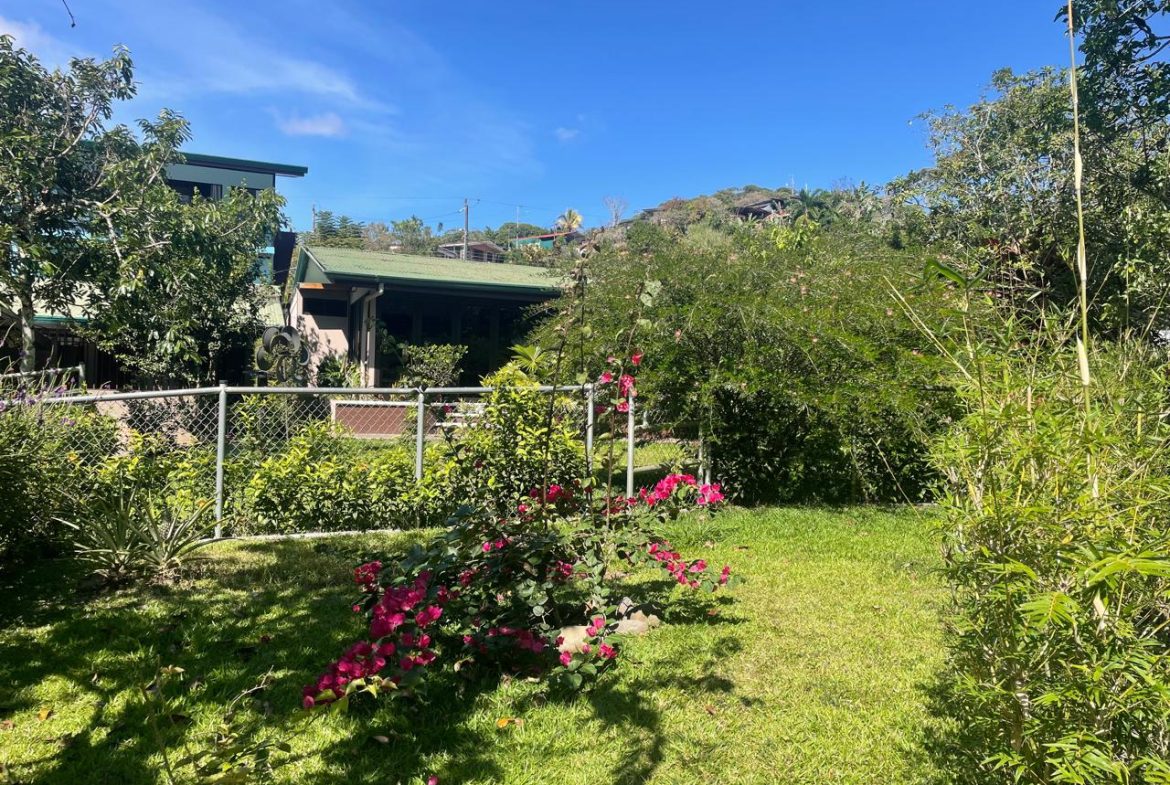 PRIVATE RIVERFRONT ESTATE WITH MAIN HOME, GUEST CABIN AND LUSH GROUNDS ON 0.68-ACRE