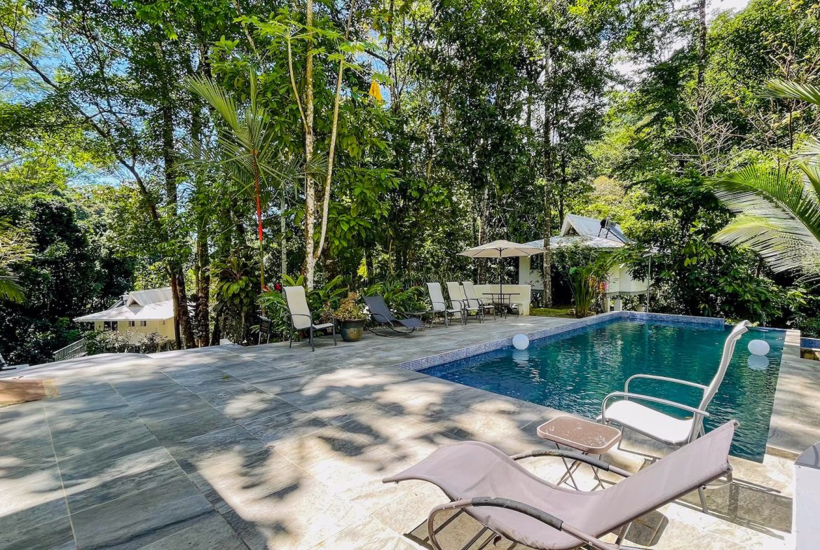 PROPERTY WITH FOUR CABINS AND A BEAUTIFUL CASCADE WITH CREEK, IN TRES RIOS – 2.45 ACRES