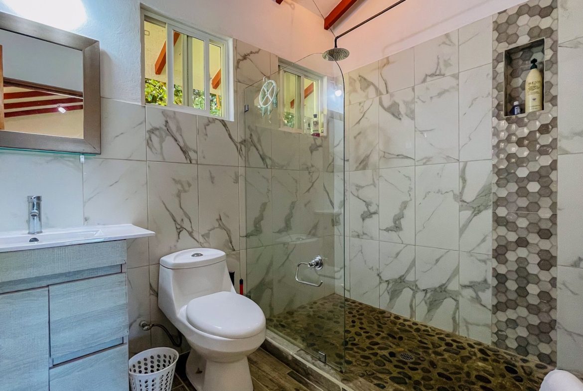 PROPERTY WITH FOUR CABINS AND A BEAUTIFUL CASCADE WITH CREEK, IN TRES RIOS – 2.45 ACRES
