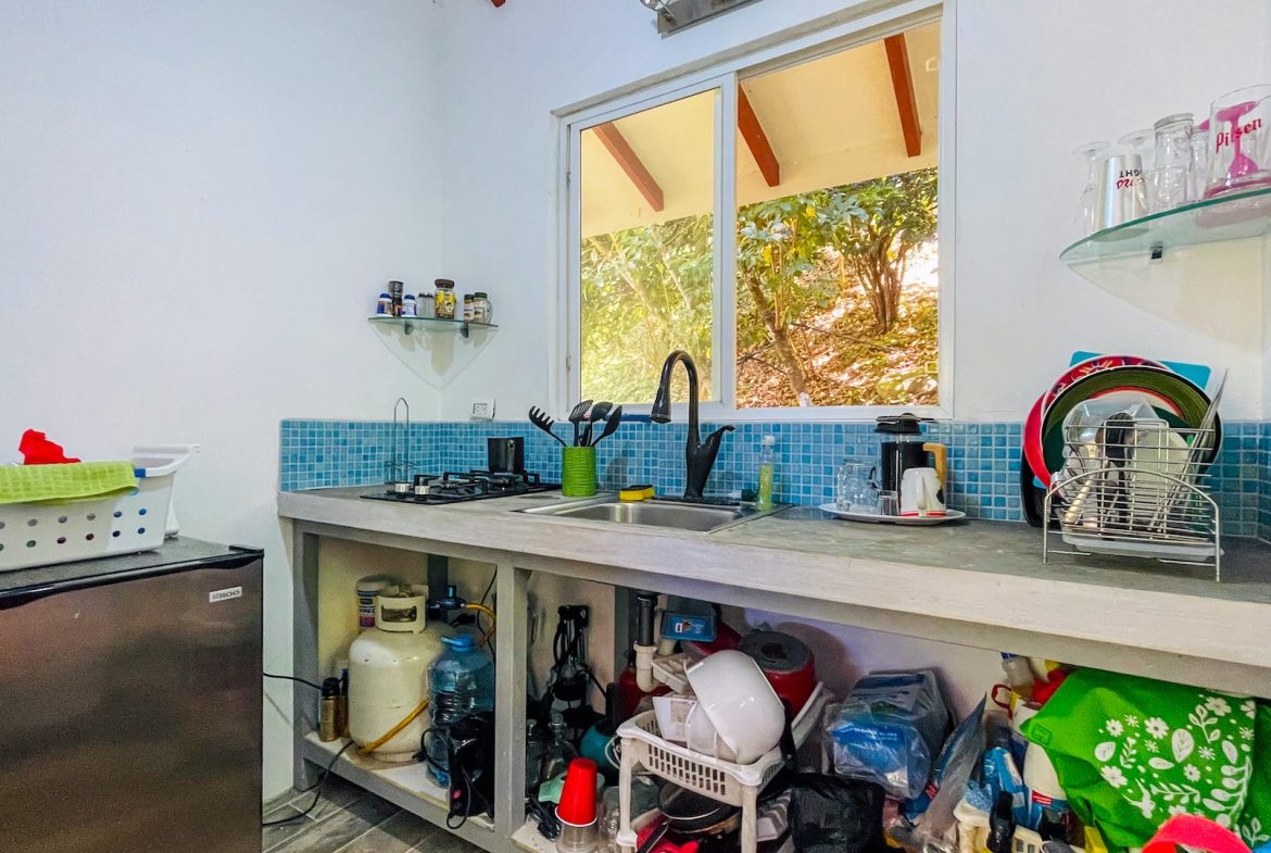 PROPERTY WITH FOUR CABINS AND A BEAUTIFUL CASCADE WITH CREEK, IN TRES RIOS – 2.45 ACRES