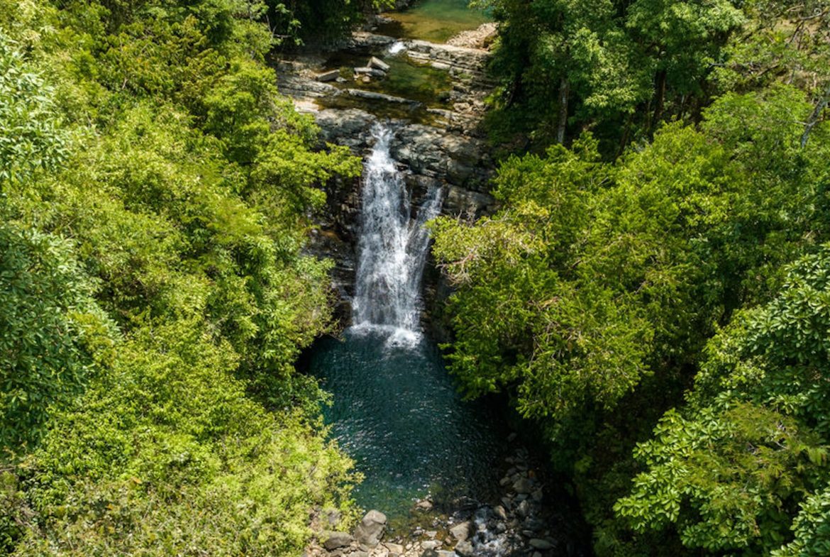DEVELOPMENT PROPERTY WITH BEAUTIFUL CASCADE, IN UVITA – 101 ACRES