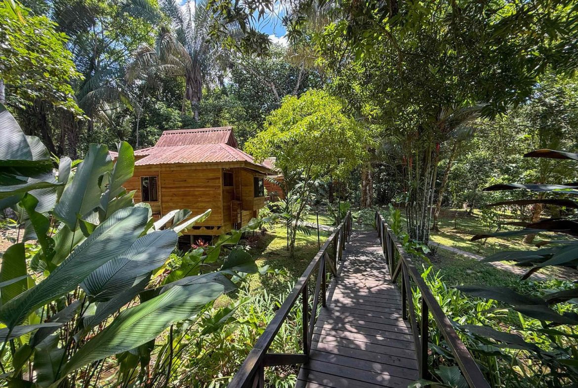 COMMERCIAL PROPERTY WITH ELEVEN BEDROOMS A STEPS OF CREEK, IN OJOCHAL – 2.22 ACRES