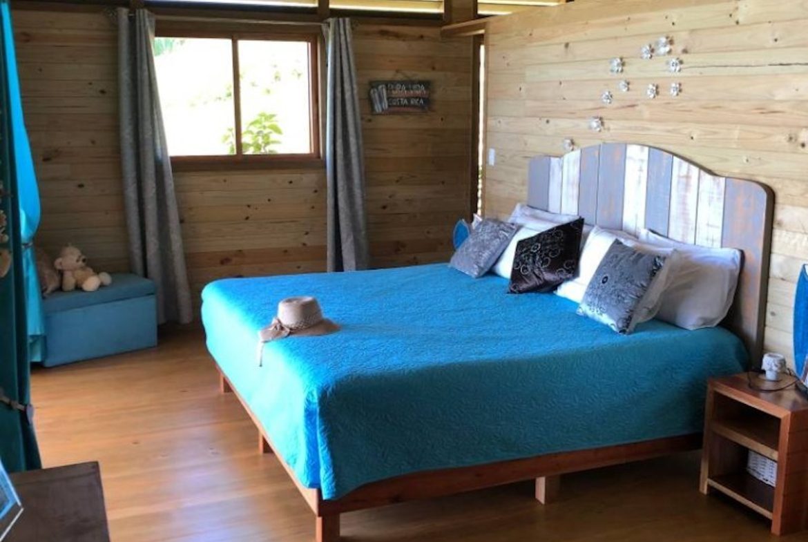 MOUNTAIN PROPERTY WITH FOUR BEDROOMS WITH OCEAN VIEWS, IN OJOCHAL – 0.28 ACRES