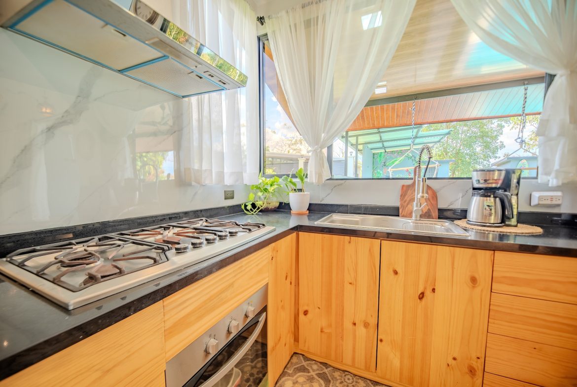 PROPERTY WITH THREE BEDROOMS AND POOL, IN VILLA NUEVA QUEPOS – 0.38 ACRES