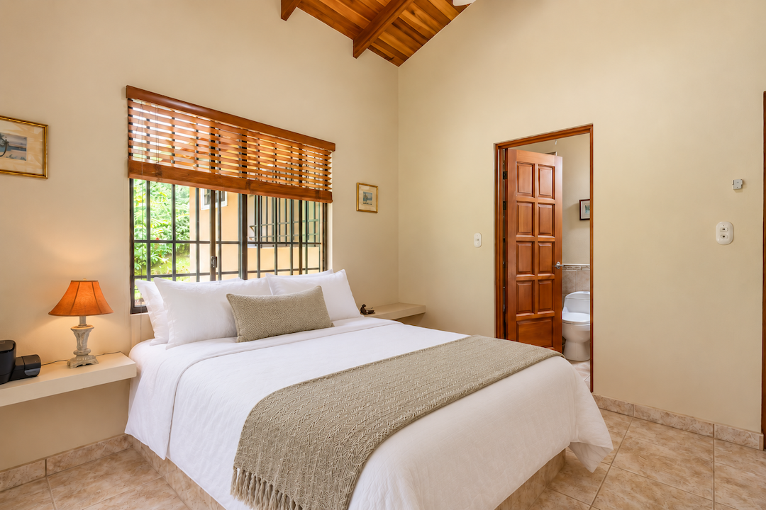 TROPICAL HOME WITH 2-BEDROOM POOL AND STREAM, IN OJOCHAL – 1.6 ACRES
