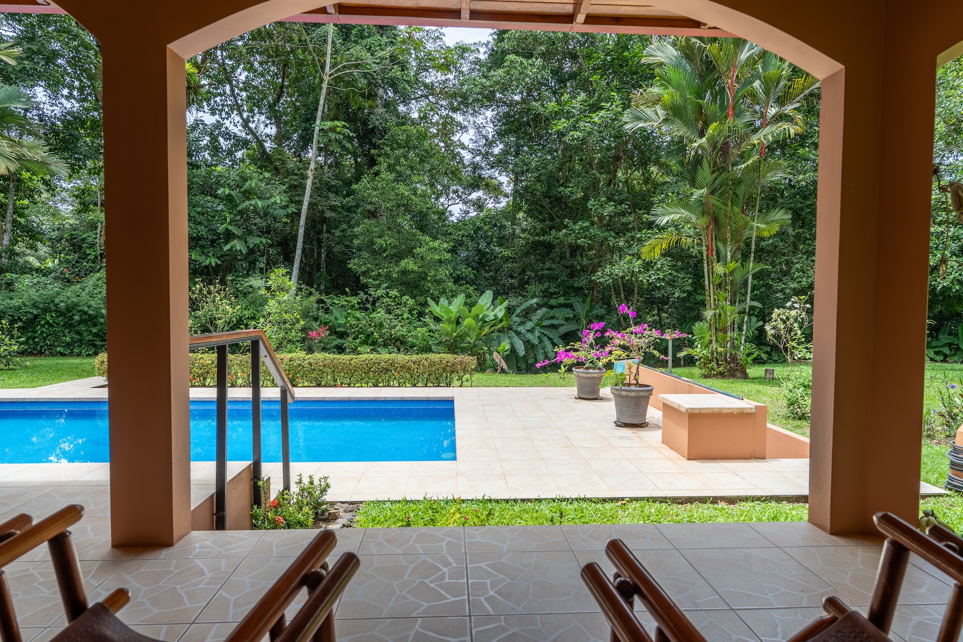 TROPICAL HOME WITH 2-BEDROOM POOL AND STREAM, IN OJOCHAL – 1.6 ACRES