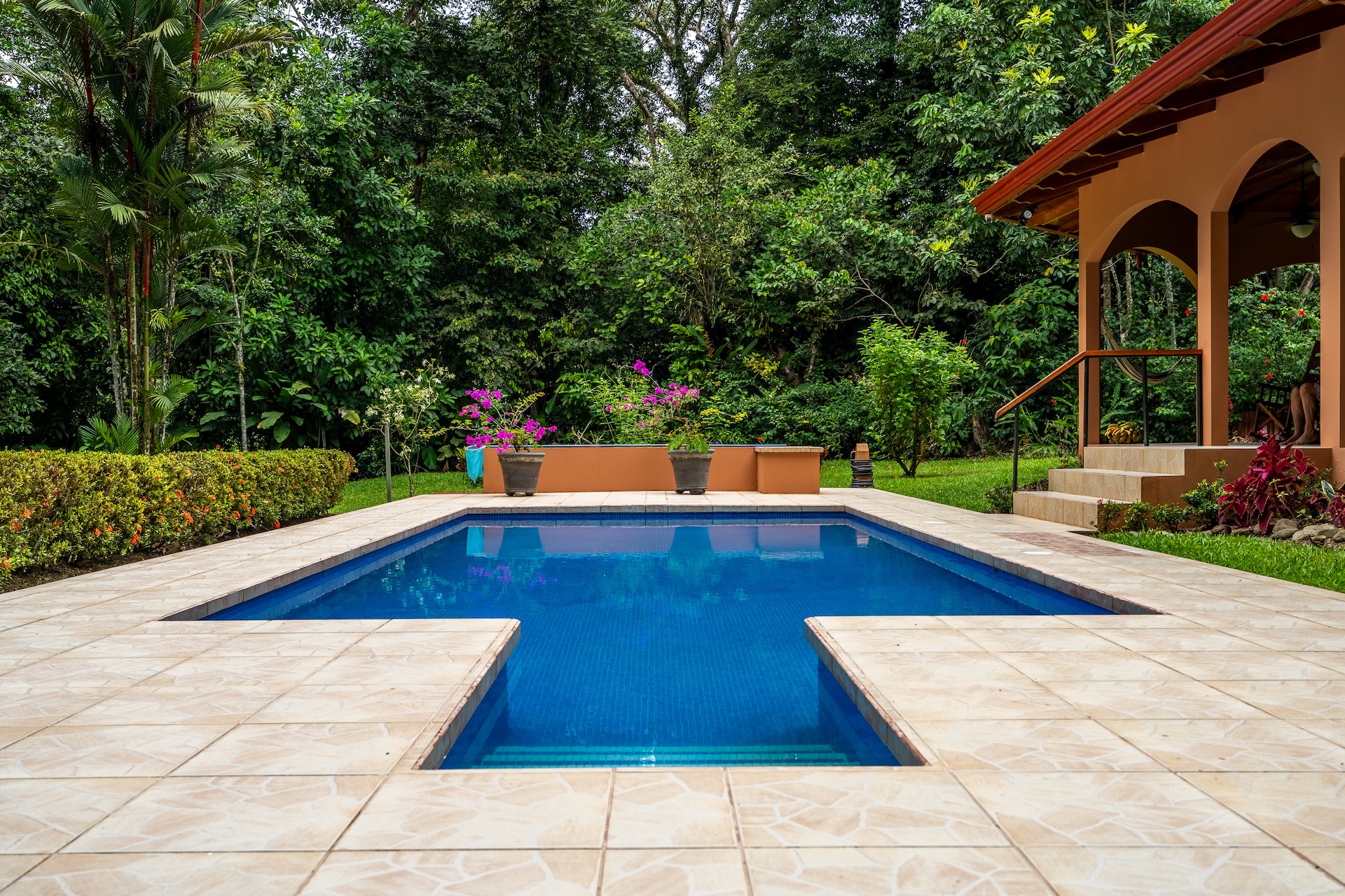 TROPICAL HOME WITH 2-BEDROOM POOL AND STREAM, IN OJOCHAL – 1.6 ACRES