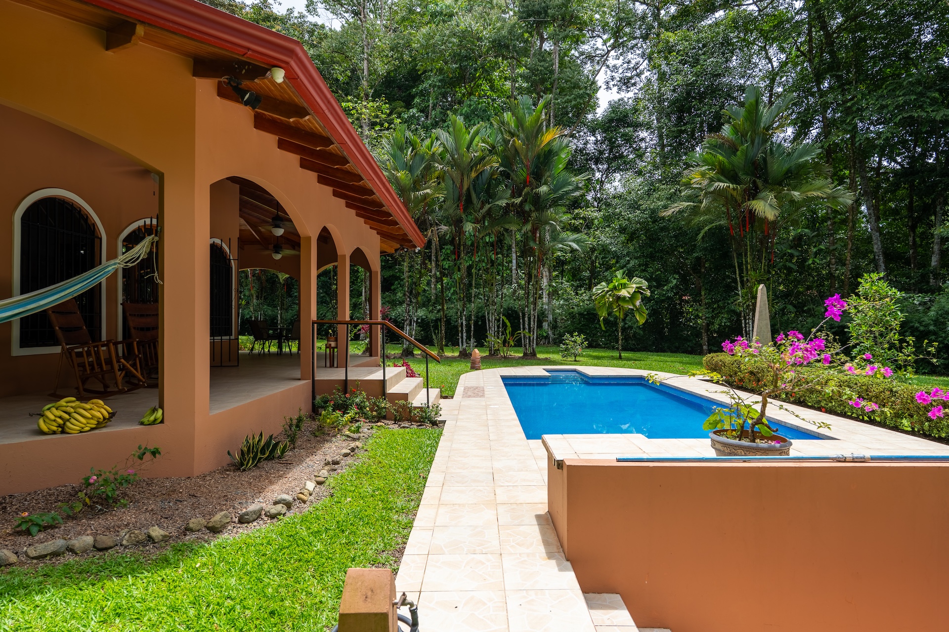 TROPICAL HOME WITH 2-BEDROOM POOL AND STREAM, IN OJOCHAL – 1.6 ACRES