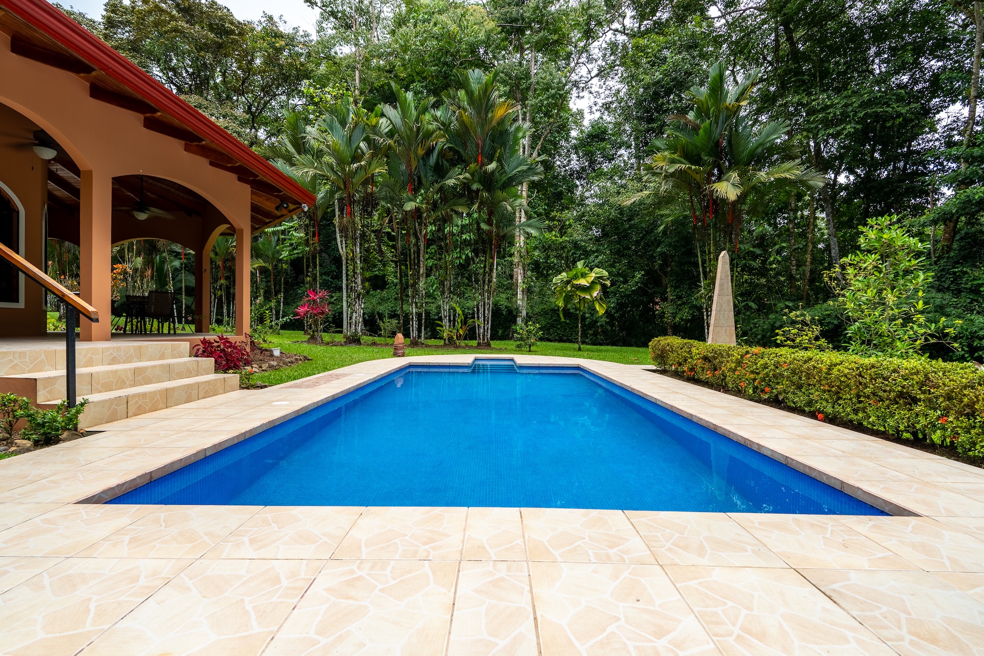 TROPICAL HOME WITH 2-BEDROOM POOL AND STREAM, IN OJOCHAL – 1.6 ACRES