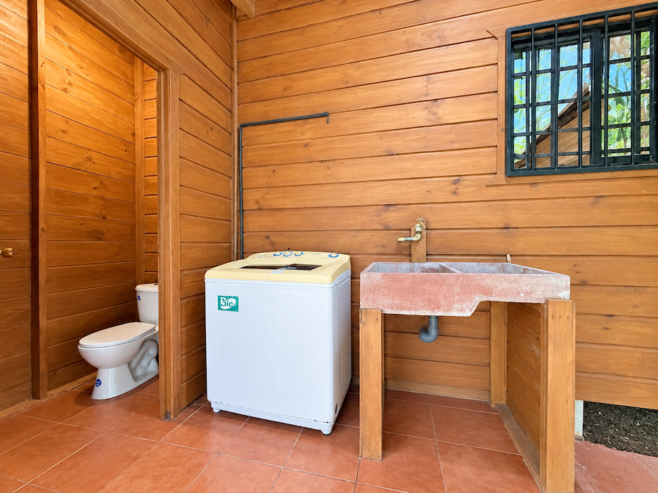 WOODEN CABIN WITH A NEARBY RIVER AND TROPICAL NATURE, IN UVITA