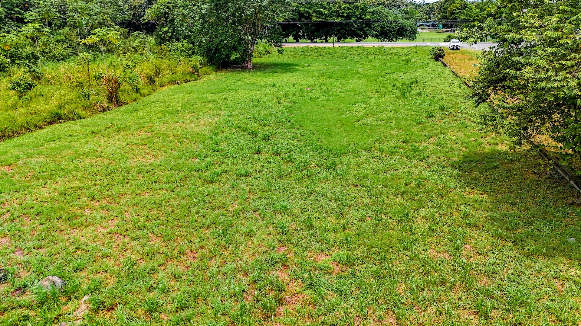 FLAT 0.59-ACRE LOT WITH DIRECT ACCESS TO THE COASTAL ROAD AND HIGH COMMERCIAL POTENTIAL IN CORONADO TRES RIOS