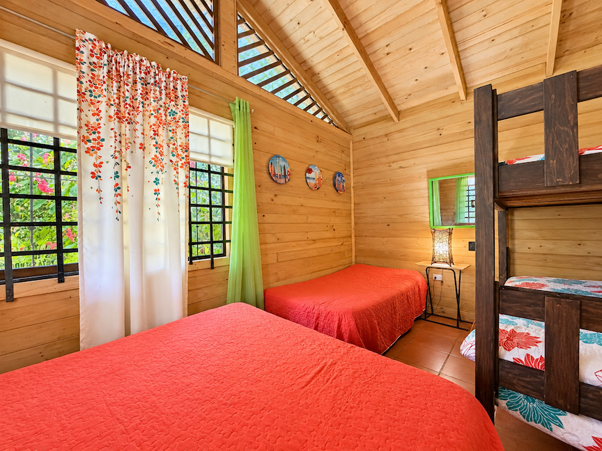WOODEN CABIN WITH A NEARBY RIVER AND TROPICAL NATURE, IN UVITA