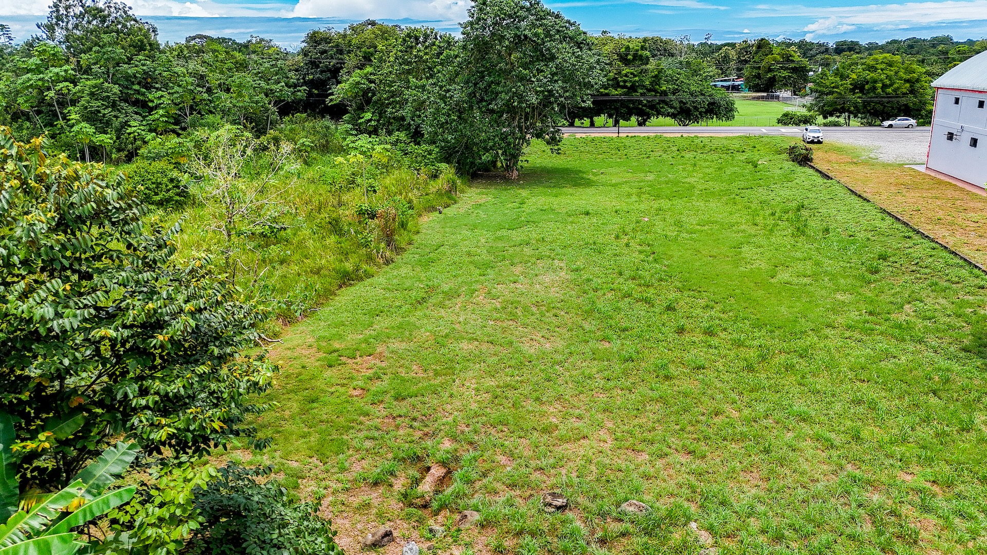 FLAT 0.59-ACRE LOT WITH DIRECT ACCESS TO THE COASTAL ROAD AND HIGH COMMERCIAL POTENTIAL IN CORONADO TRES RIOS