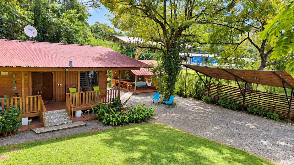 WOODEN CABIN WITH A NEARBY RIVER AND TROPICAL NATURE, IN UVITA