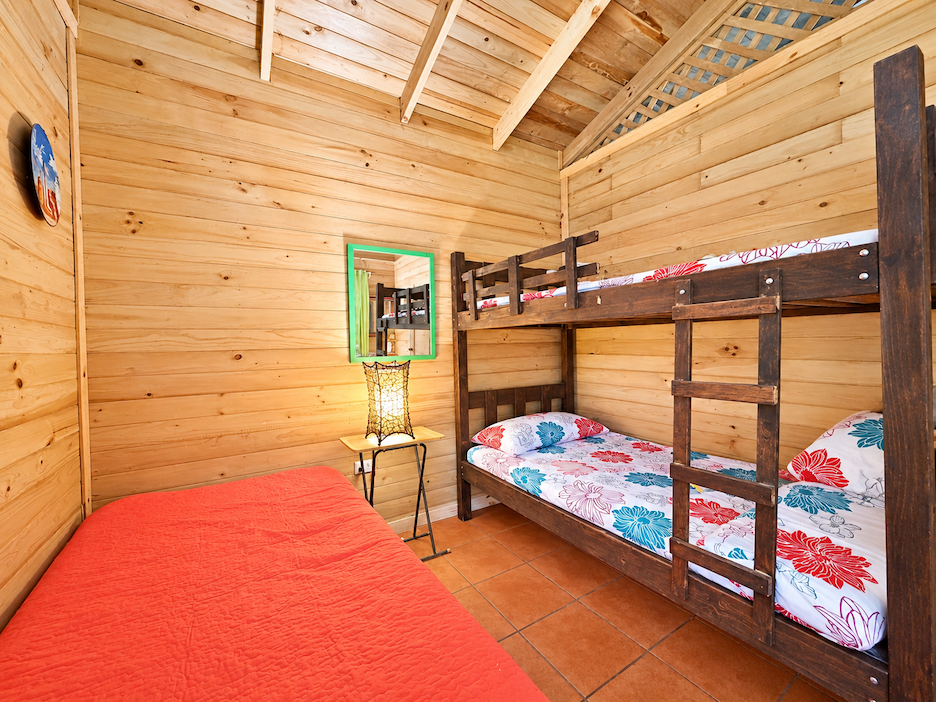 WOODEN CABIN WITH A NEARBY RIVER AND TROPICAL NATURE, IN UVITA