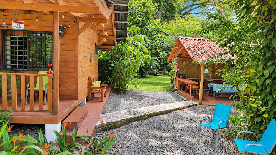 WOODEN CABIN WITH A NEARBY RIVER AND TROPICAL NATURE, IN UVITA