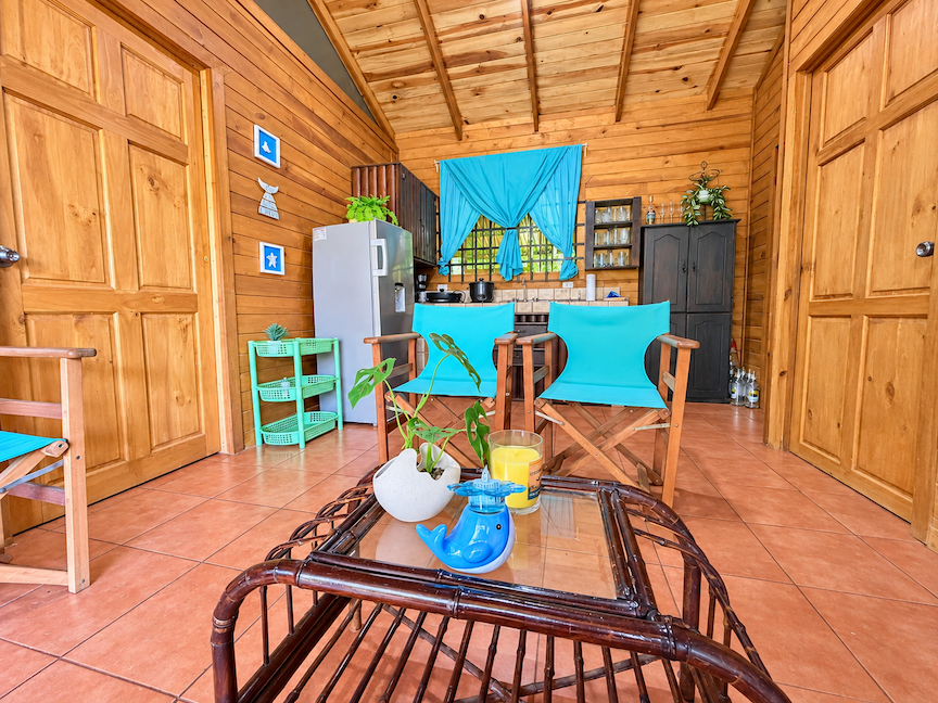 WOODEN CABIN WITH A NEARBY RIVER AND TROPICAL NATURE, IN UVITA