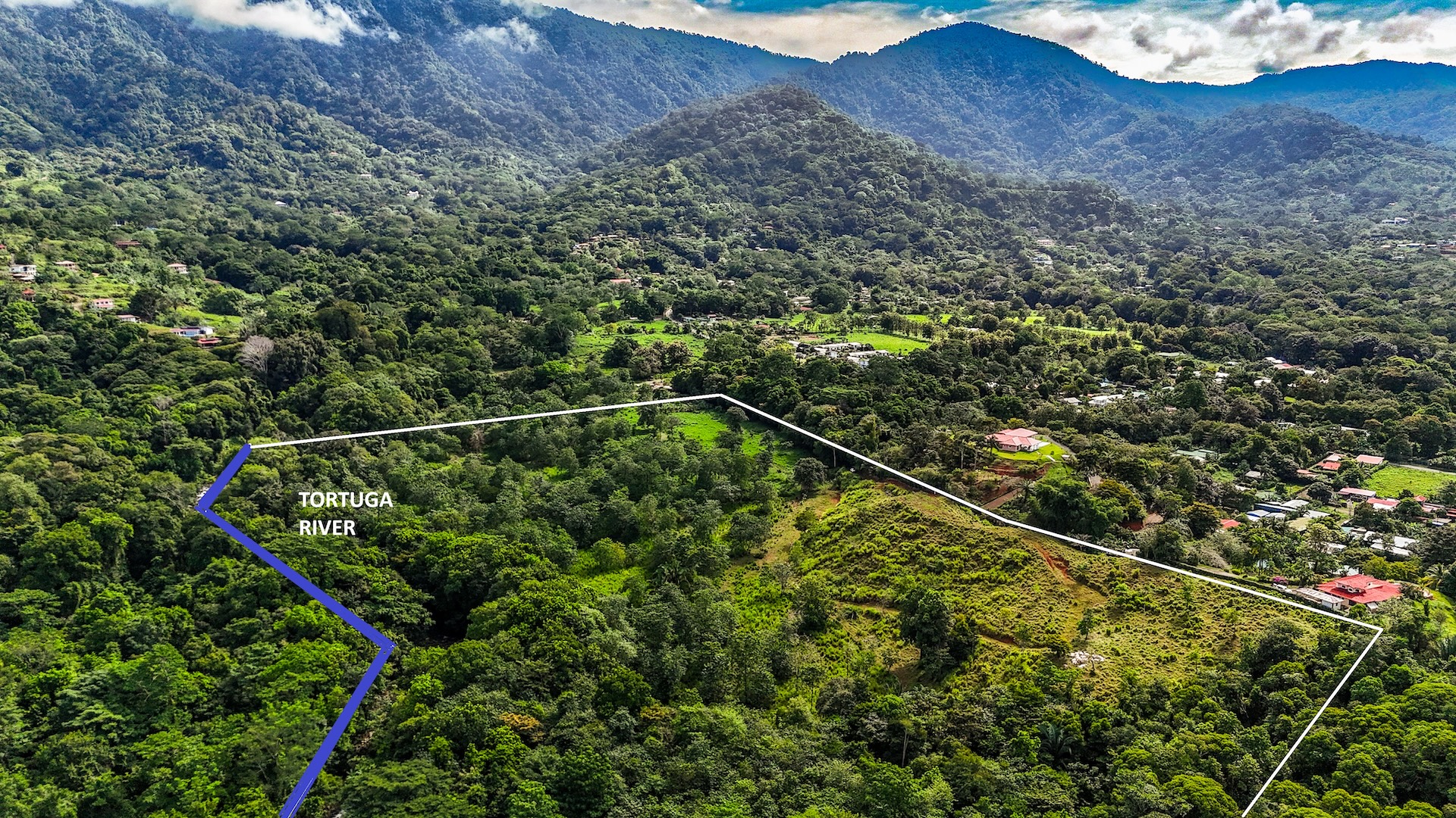 PROPERTY WITH RIVER, FRUIT TREES, AND MOUNTAIN VIEWS, IN OJOCHAL – 22 ACRES