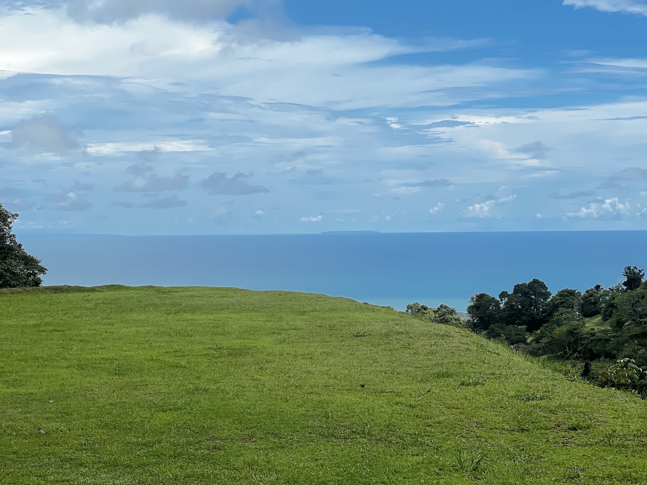 PRIVATE PLOT WITH OCEAN VIEWS AND A LARGE BUILDING PLATFORM, IN PORTALON – 2.06 ACRES