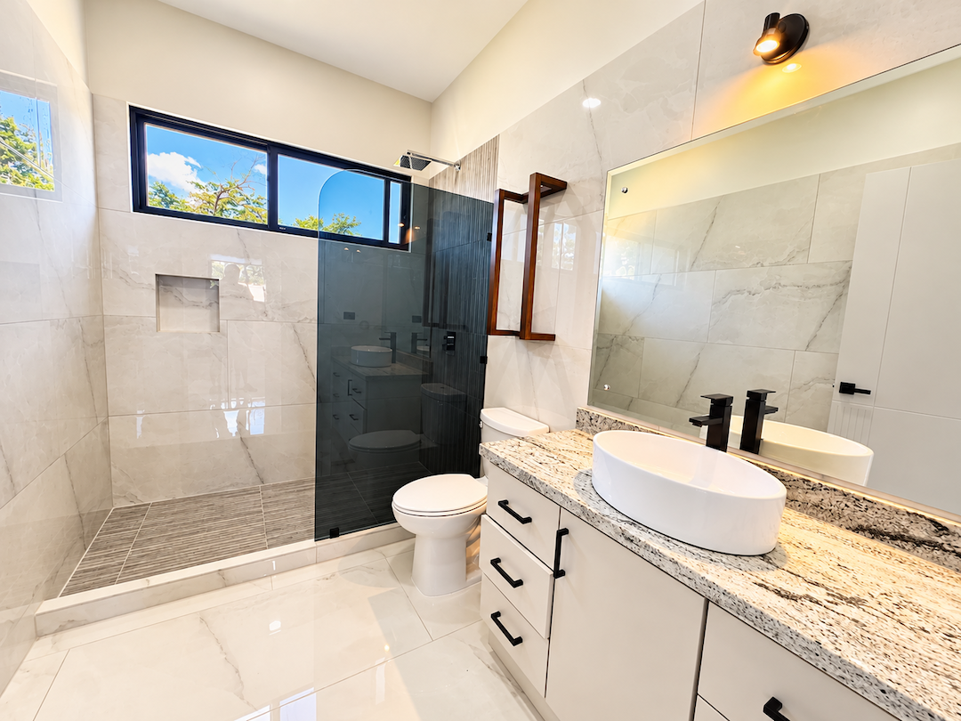 CONTEMPORARY 3-BEDROOM HOME WITH POOL AND TROPICAL GARDENS, IN UVITA – 0.11 ACRES