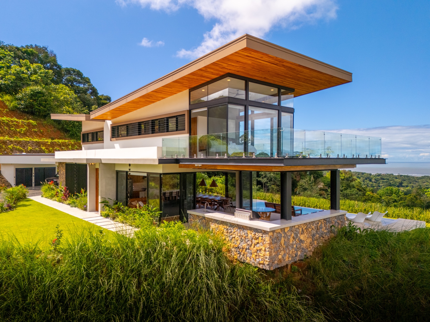 LUXURY HOME WITH OCEAN VIEWS, SOLAR POWER, AND CONTEMPORARY DESIGN, IN OJOCHAL – 1.24 ACRES