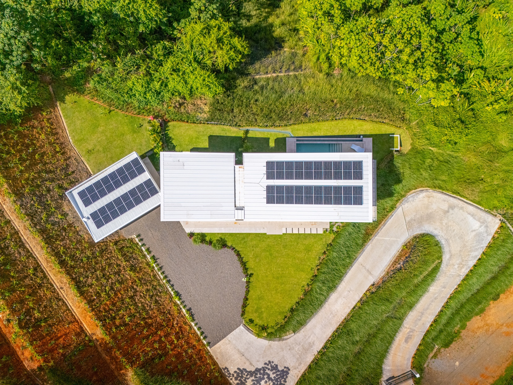 LUXURY HOME WITH OCEAN VIEWS, SOLAR POWER, AND CONTEMPORARY DESIGN, IN OJOCHAL – 1.24 ACRES