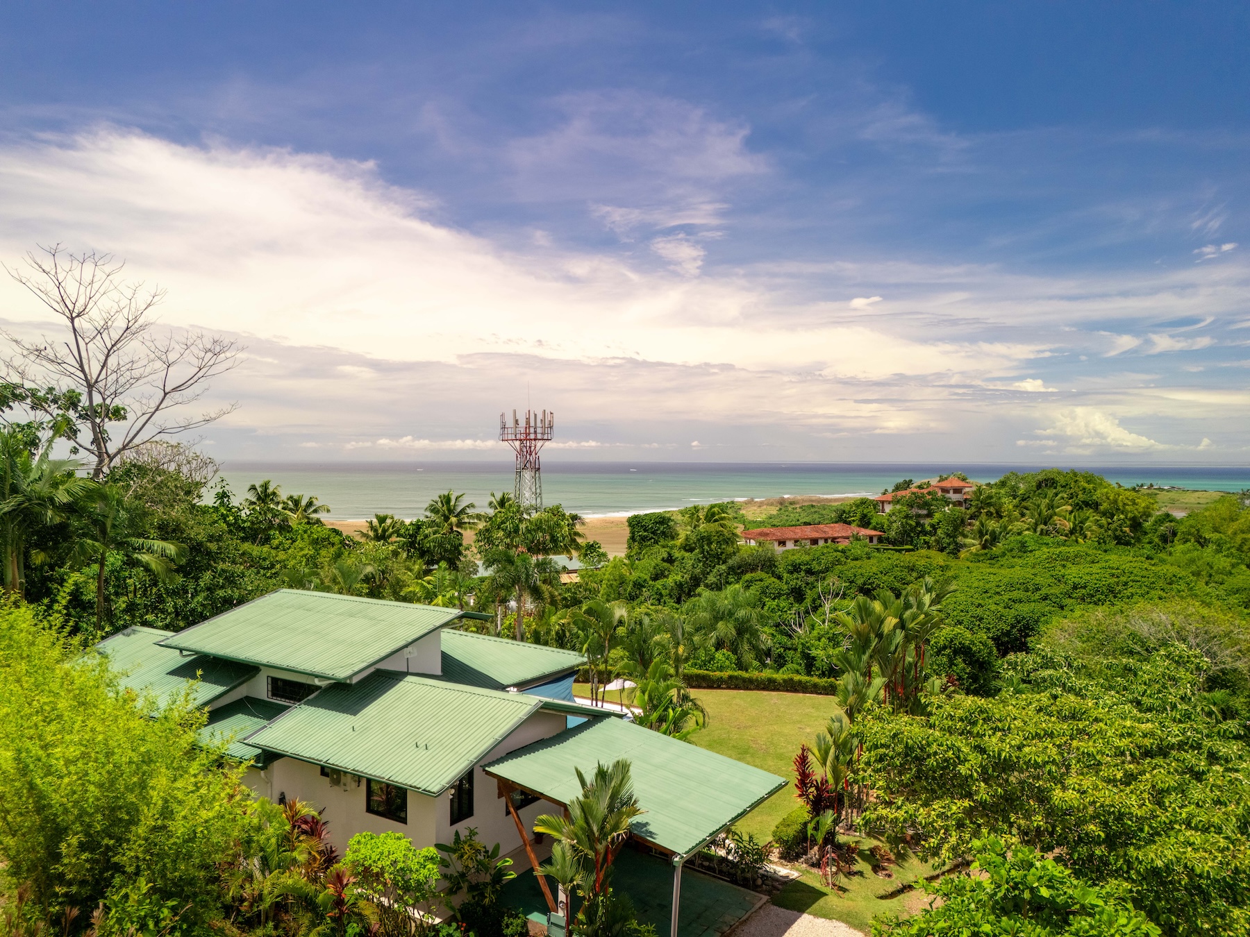 TROPICAL HOME WITH PRIVATE POOL, OCEAN AND MOUNTAIN VIEWS, IN OJOCHAL – 0.80 ACRES