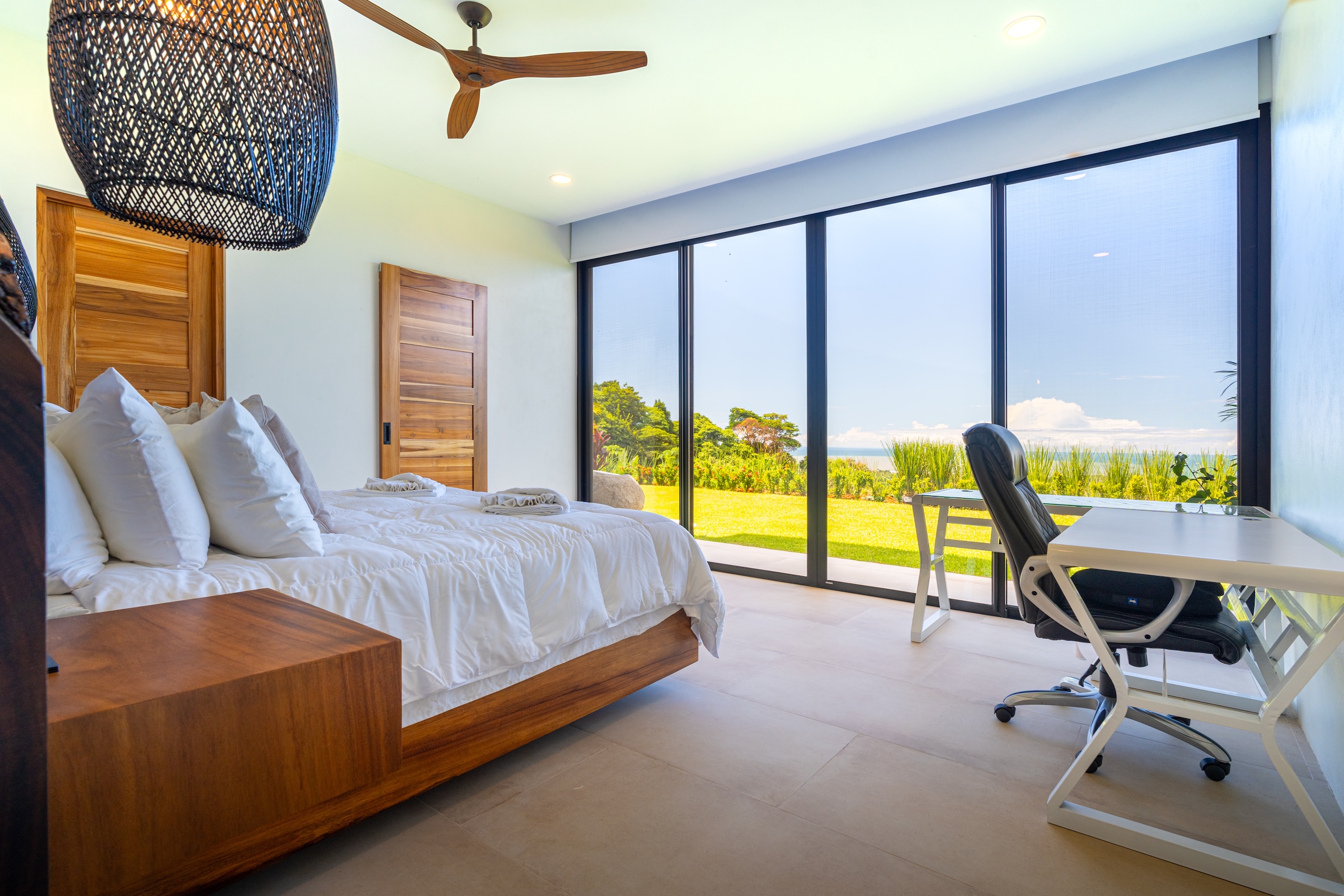 LUXURY HOME WITH OCEAN VIEWS, SOLAR POWER, AND CONTEMPORARY DESIGN, IN OJOCHAL – 1.24 ACRES