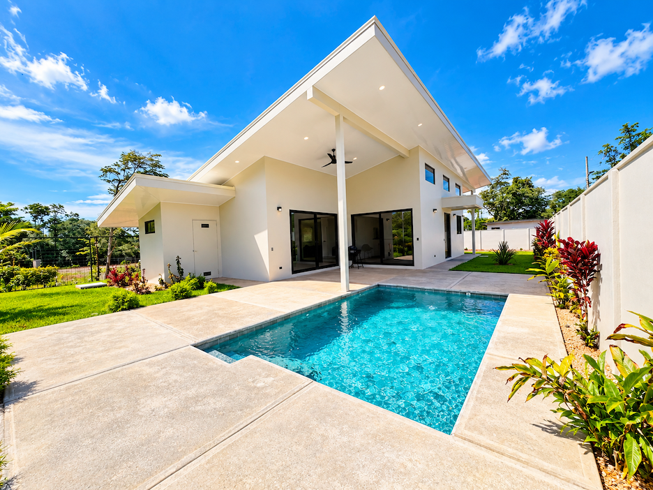 CONTEMPORARY 3-BEDROOM HOME WITH POOL AND TROPICAL GARDENS, IN UVITA – 0.11 ACRES