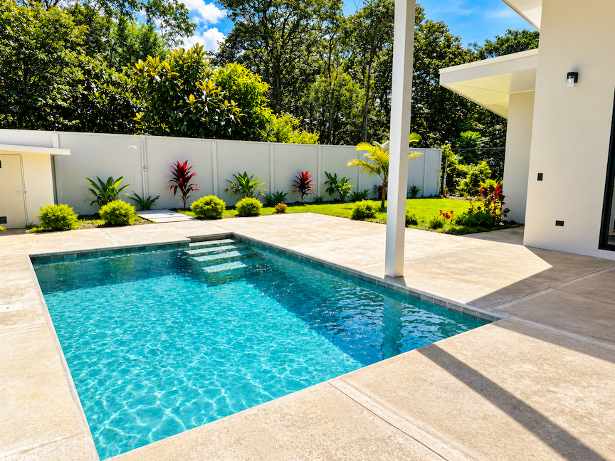 CONTEMPORARY 3-BEDROOM HOME WITH POOL AND TROPICAL GARDENS, IN UVITA – 0.11 ACRES