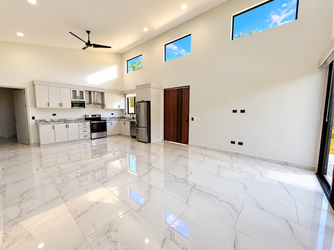 CONTEMPORARY 3-BEDROOM HOME WITH POOL AND TROPICAL GARDENS, IN UVITA – 0.11 ACRES