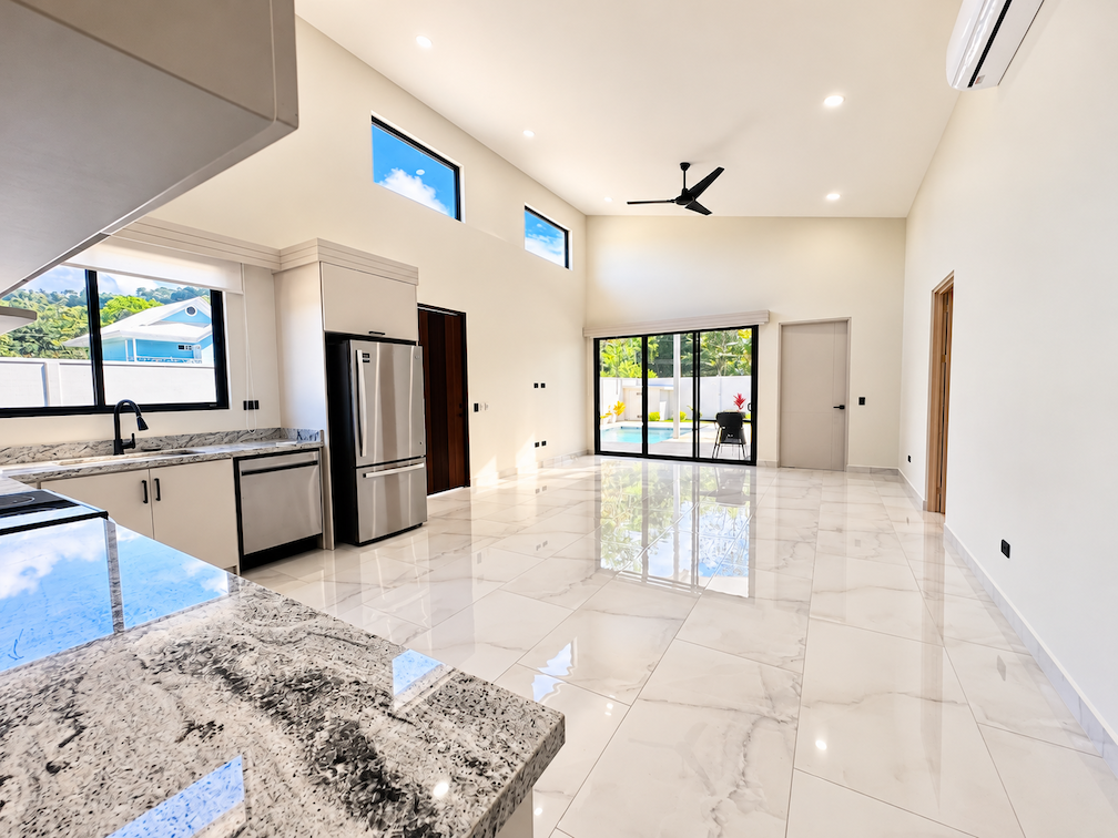 CONTEMPORARY 3-BEDROOM HOME WITH POOL AND TROPICAL GARDENS, IN UVITA – 0.11 ACRES